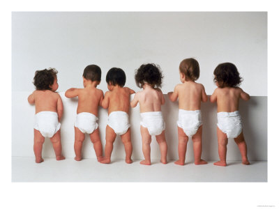 babies trying diapers