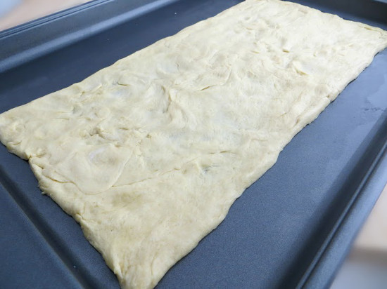 making-crust-fresh-veggie-cream-cheese-pizza