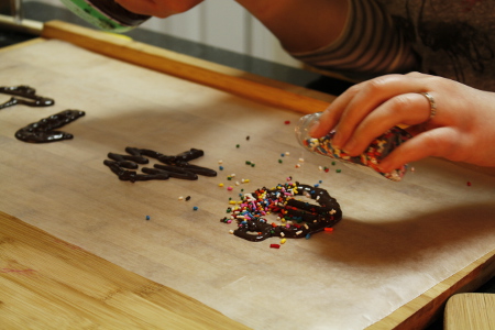 puttting-sprinkles-on-chocolate-designs
