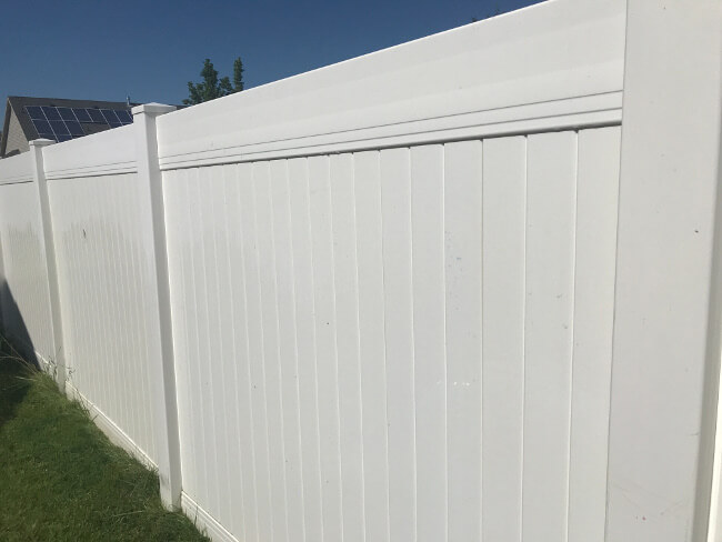 white clean fence after goblies water gun play paint